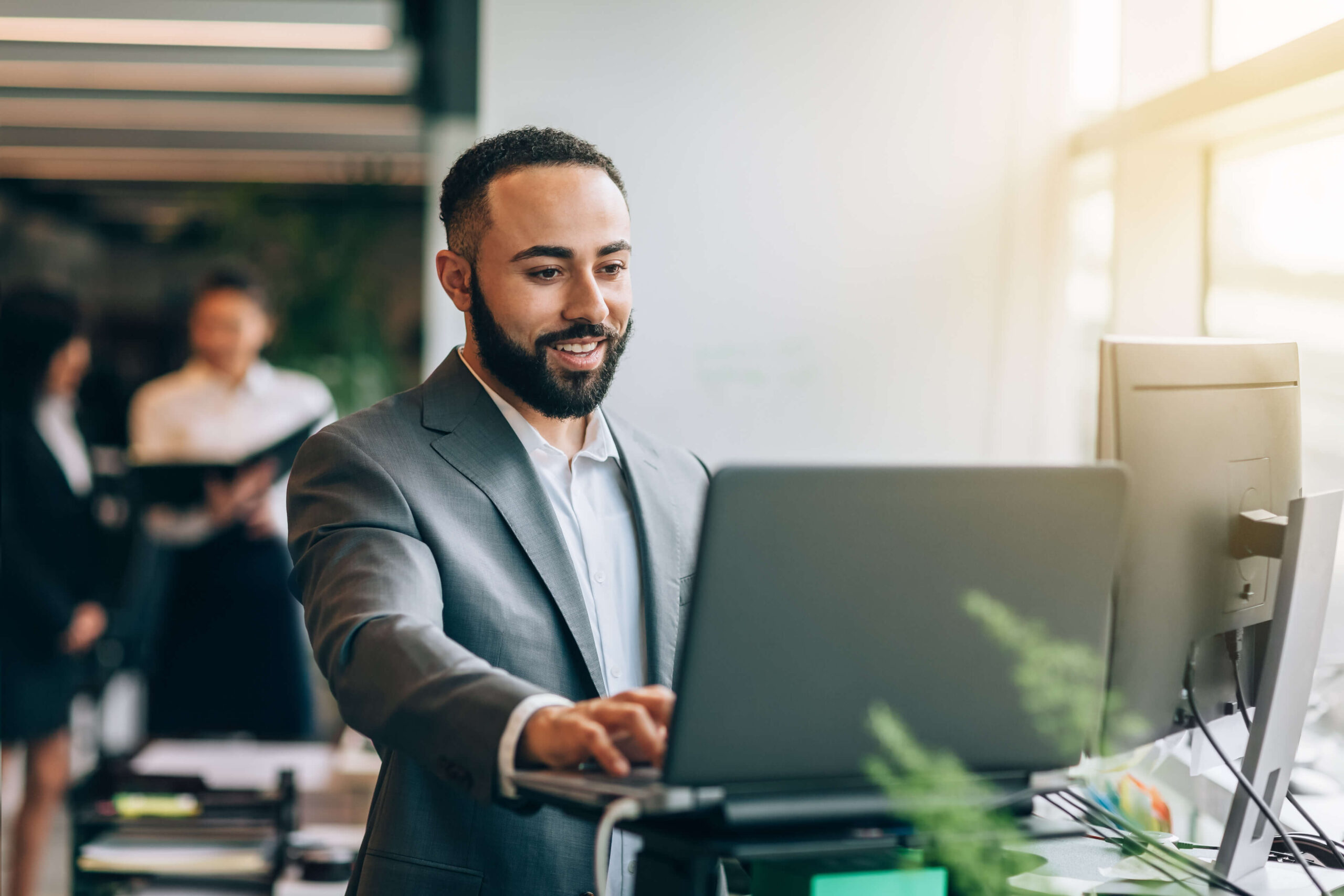 business professional at standing desk