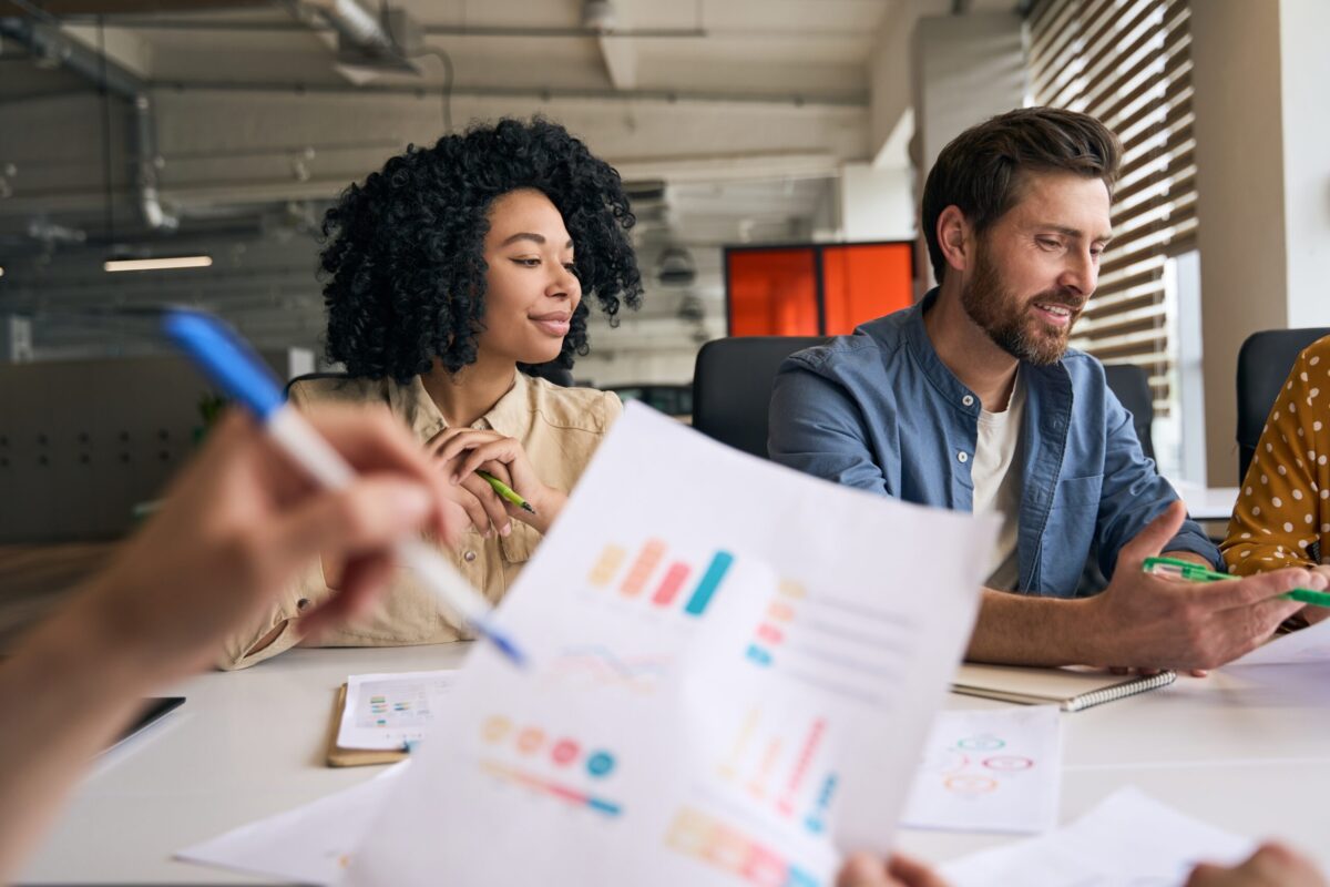 Talent team reviewing data together at a desk